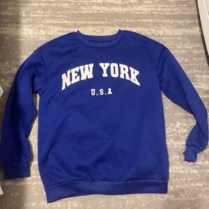 Cute royal blue crew-neck Xs but fits like a small